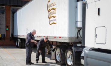 Colonial Cartage maintenance techs performing a safety check